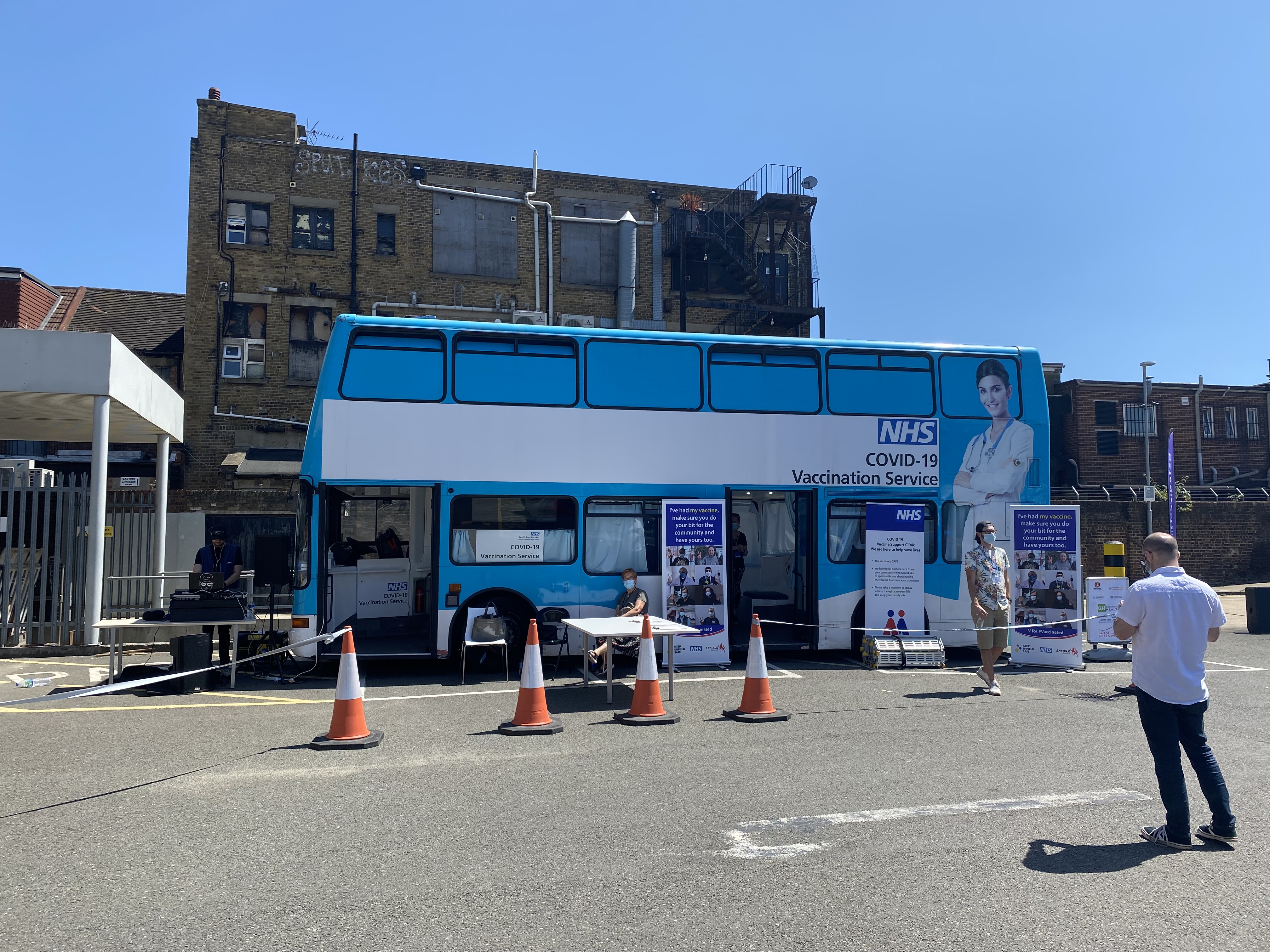 Photo of an NHS COVID-19
vaccination bus.